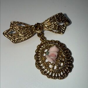 Elegant Gold tone bow dangle Brooch with Pink Rose